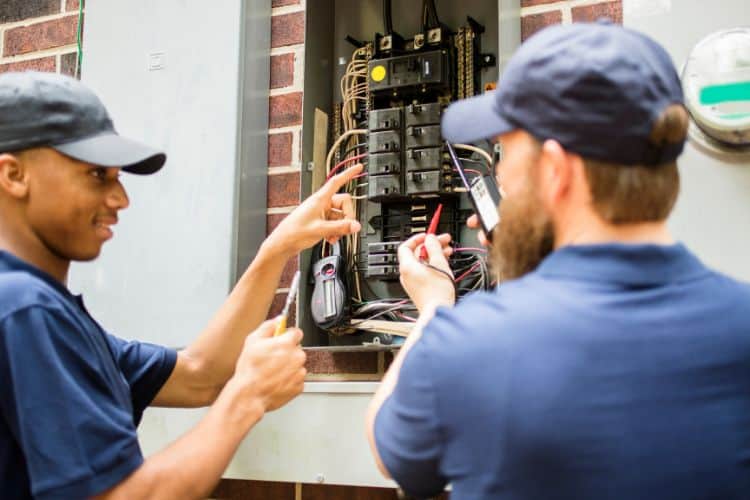 Electrician Working on a Residential Breaker Box